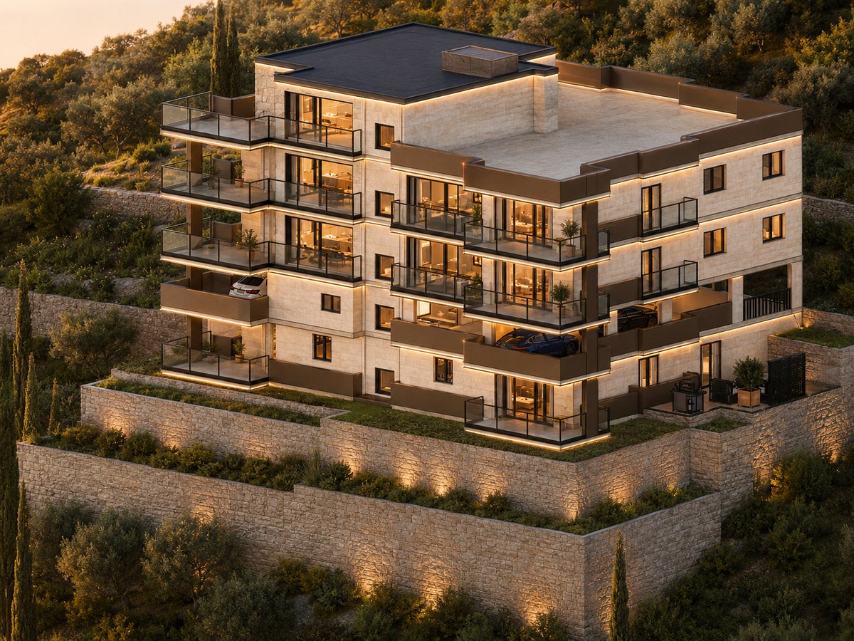 Aurea Residence at dusk above its terraced stone gardens on the hillside